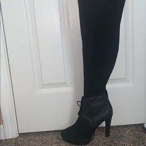 Jennifer Lopez over knee boots